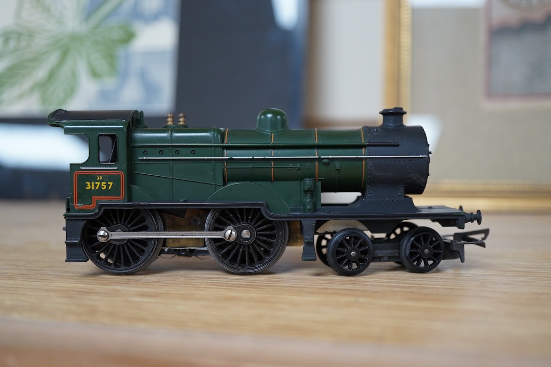 A quantity of 00 gauge model railway by Hornby, Tri-ang, etc. including nineteen locomotives in BR, GWR, LMS, etc. liveries, together with a boxed electrically operated turntable (R070), a terraced house (R8621) and a ga